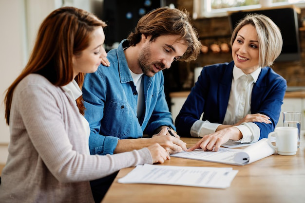 an insurance agent with clients.