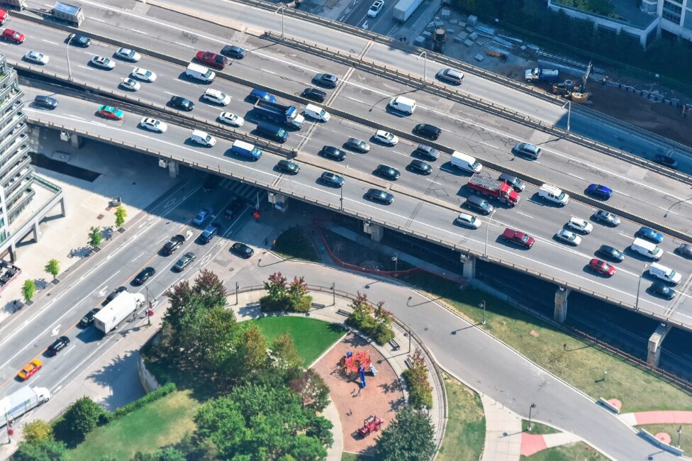 A busy highway with heavy traffic, illustrating commercial vehicle activity.